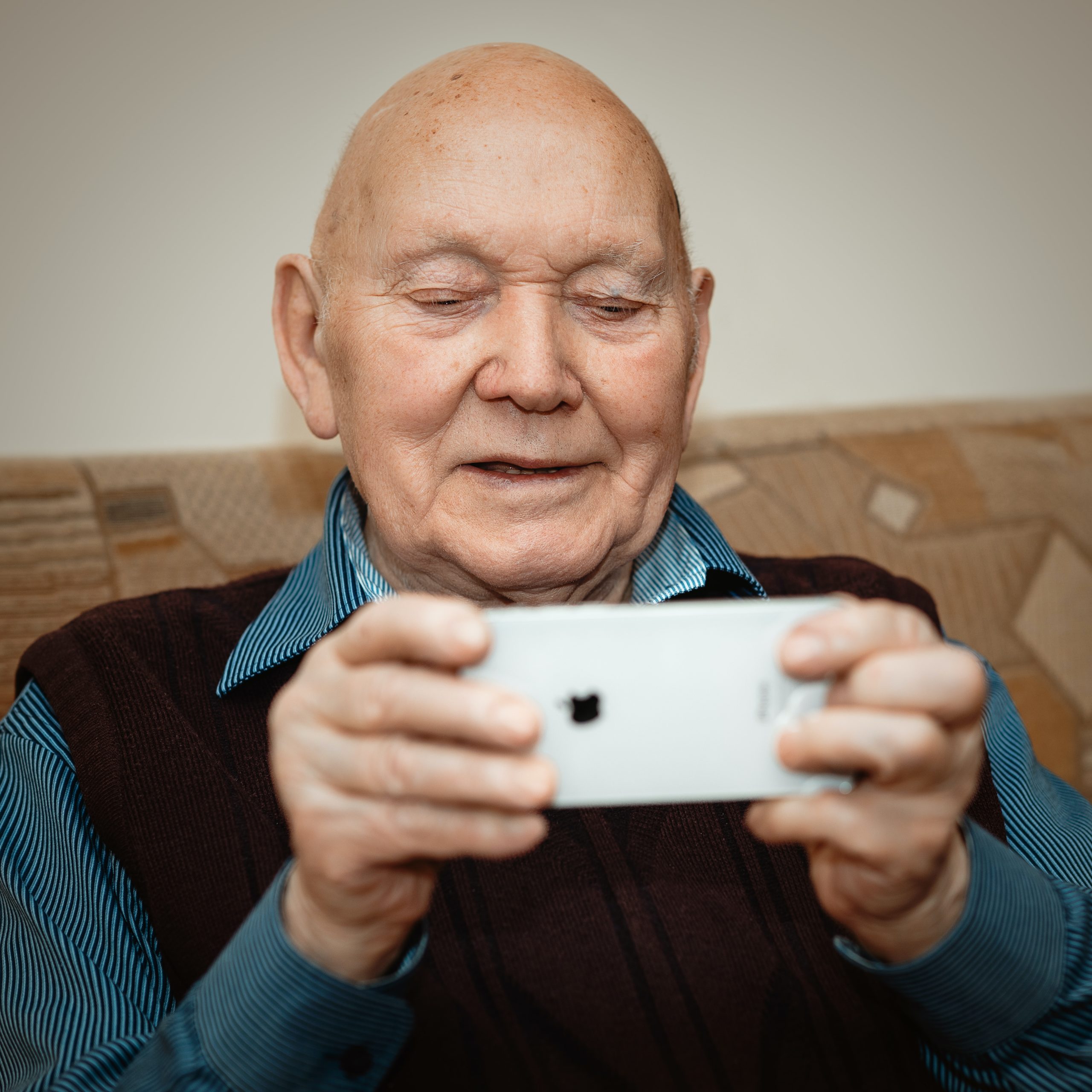 Older man using smartphone