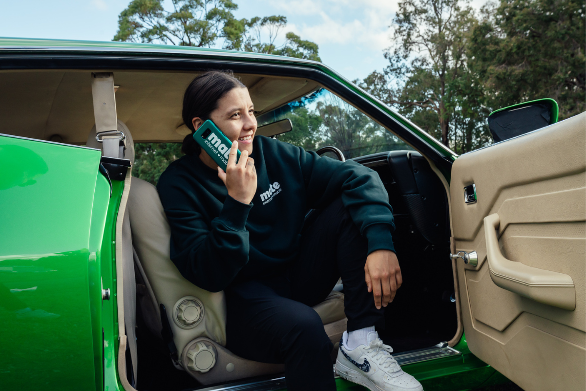 Sam Kerr on mobile phone