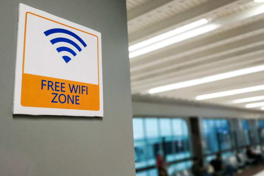 wifi sign indicating free service in airport waiting area