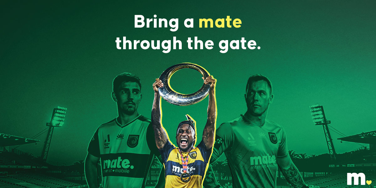 celebrating player lifting trophy at the stadium by the mate