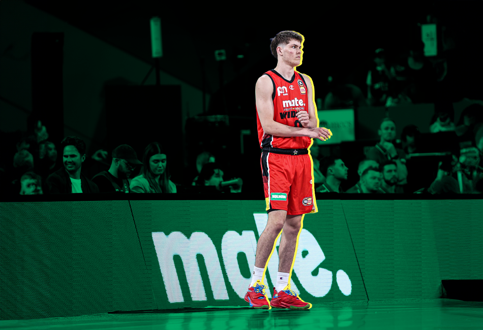 basketball player preparing on court at sporting event.