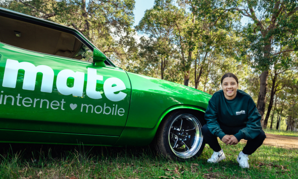 Sam Kerr with MATE car