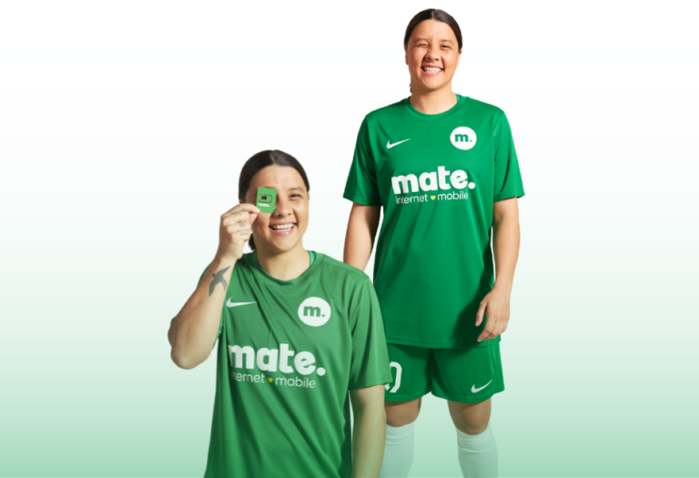 athlete holding chip, smiling in mate internet mobile gear.