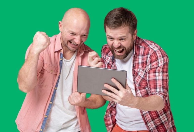 Guys celebrating watching the game