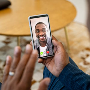 Business Man Doing Video Call With Colleague