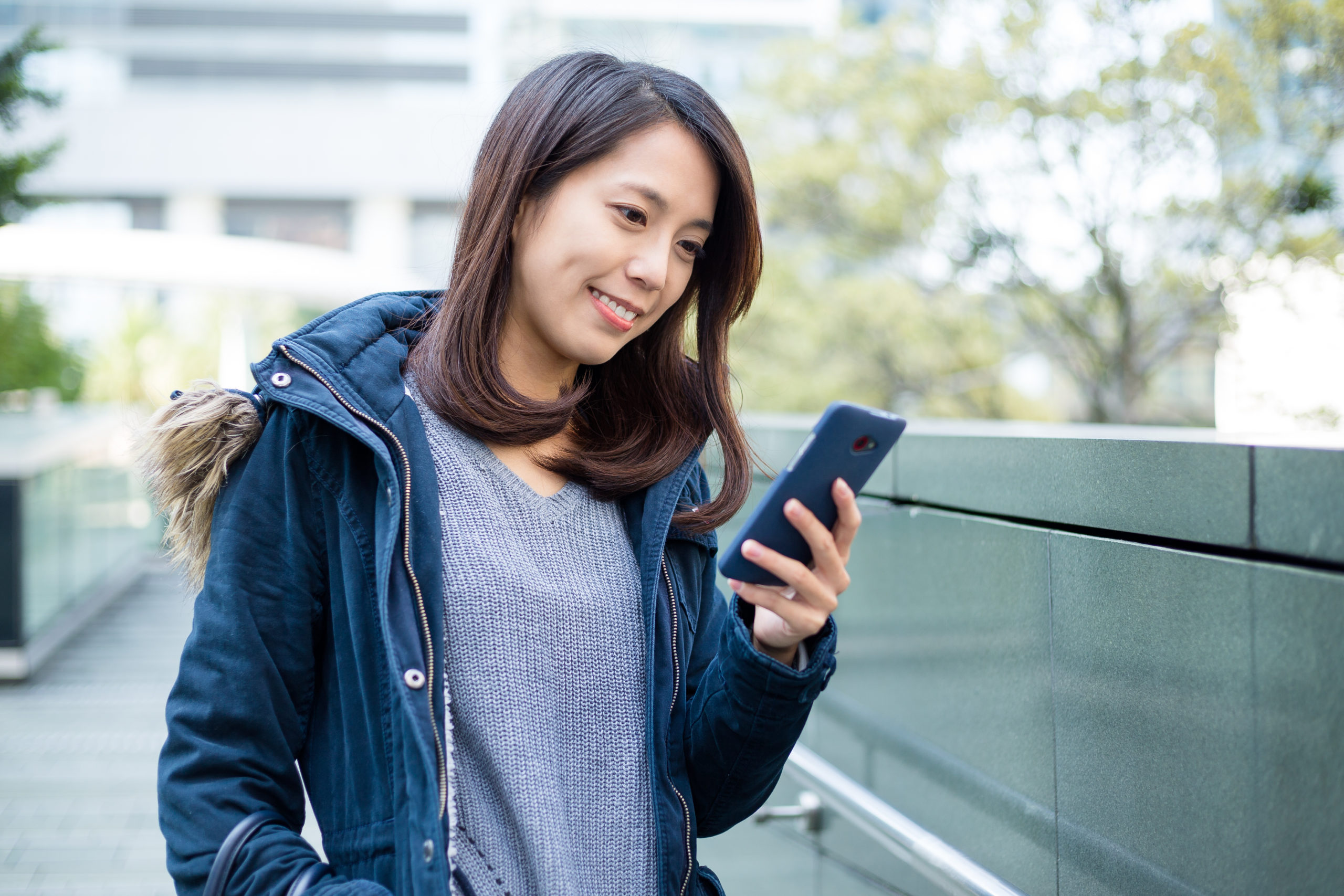 Young Woman Look At Cellphone