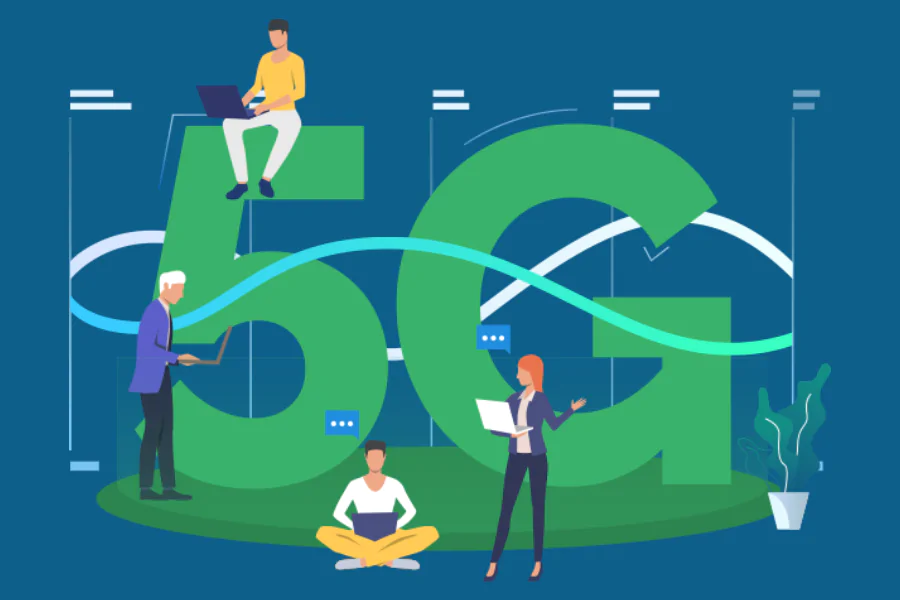 people engaging with technology around large 5g symbol.